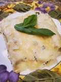 Brad's crab florentine manicotti w/ parmesan, basil, caper sauce