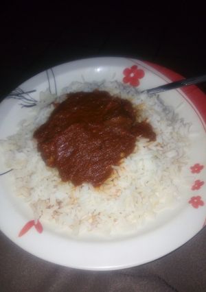 A picture of White Rice and stew.