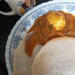 A picture of Egg curry in coconut milk.