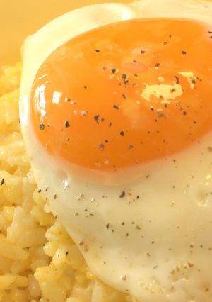 A picture of Golden soft-boiled Egg Fried Rice 🥚.