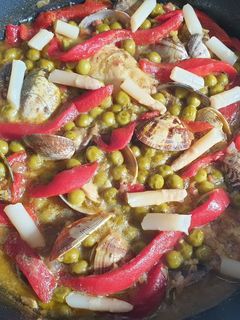 Una foto de Merluza con almejas