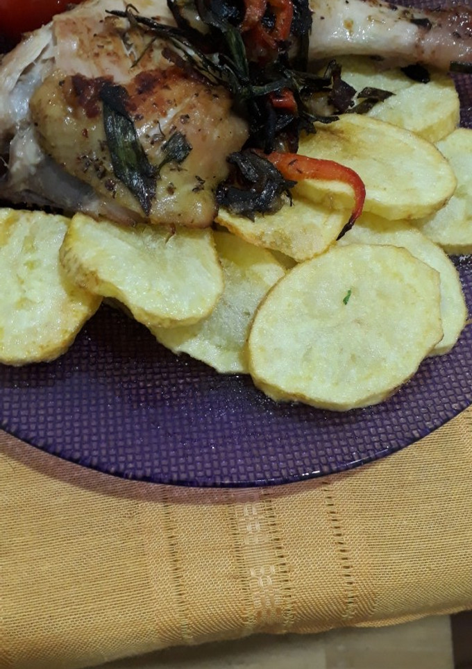 Una foto de Pollo con papas fritas