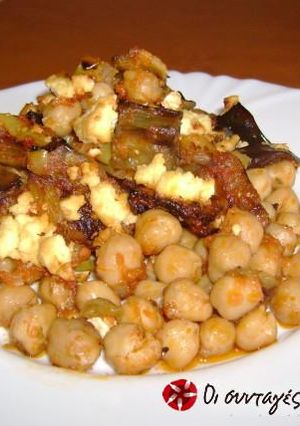 A picture of Chickpeas in the Dutch oven with eggplants.