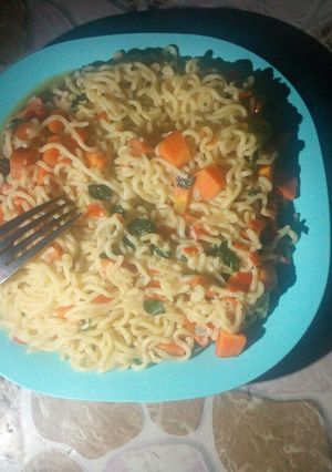 A picture of Carrots and moringa noodles.