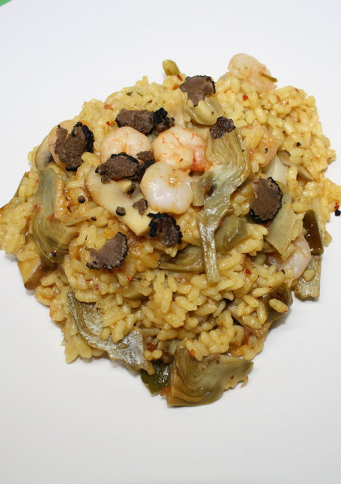 Una foto de Arroz con verduritas, gambas y trufa