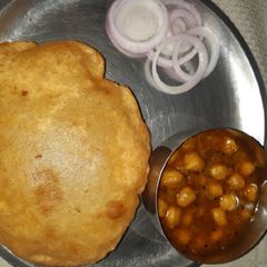 A picture of Bread bhature with chole.