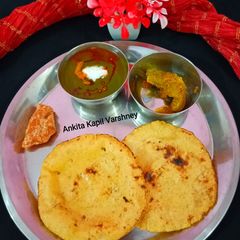A picture of Sarson Ka Saag with Makki Ki Roti.