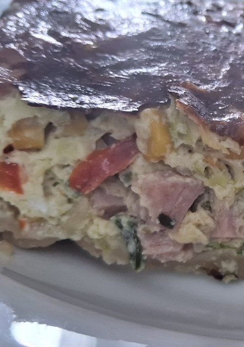 Una foto de Tarta de puerro, cebolla y maíz