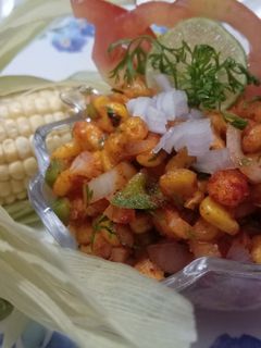 फ्राईड कॉर्न चाट (fried corn chaat recipe in marathi) रेसिपी चे मुख्य फोटो 