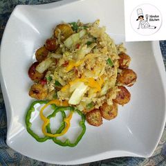 Fried plantain with steamed cabbage and egg A picture of Fried plantain with steamed cabbage and egg.