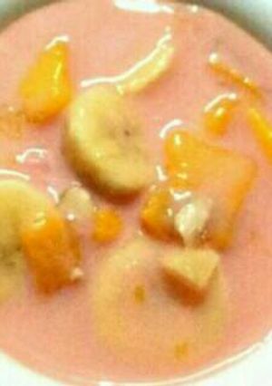 A picture of Orange flavoured fruit raita.