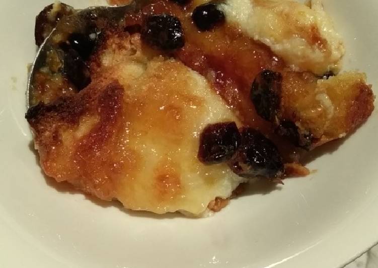 Bread and butter pudding with jam and cranberries