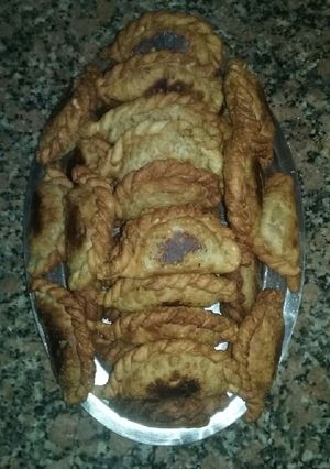 Una foto de Empanadas fritas o al horno cortada a cuchillo