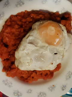 Una foto de Arroz con tomate y Huevo