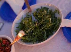Una foto de Ensalada de rúcula y parmesano