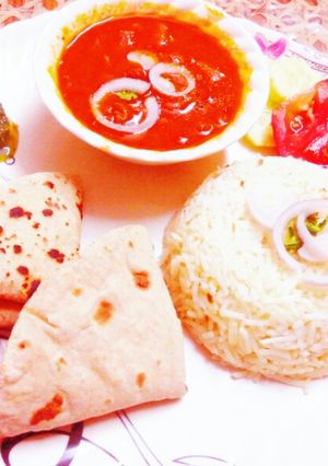 A picture of Rajma masala and zeera rice.