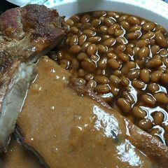 A picture of Ribs with Ice Cream barbecue sauce.