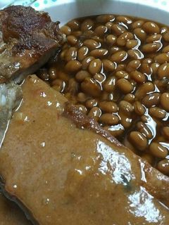 A picture of Ribs with Ice Cream barbecue sauce.