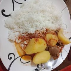 A picture of Beef n Potato stew with rice.