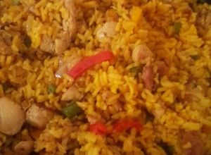 Una foto de Arroz con Pollo y Chuleta Ahumada