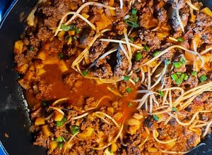 Una foto de Picadillo con frijoles chinos