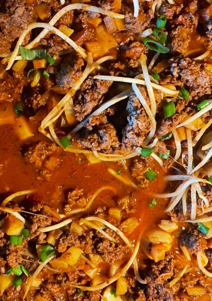Una foto de Picadillo con frijoles chinos