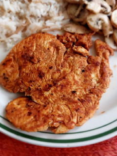 Una foto de Milanesas de pollo asadas a la Valentina