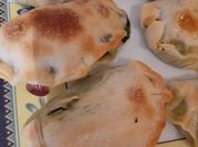 Una foto de empanadas de ricotta