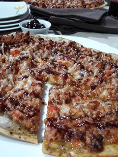 Una foto de Pizza barbacoa