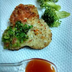 A picture of Rava cheese veggie flower pattice.