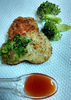 A picture of Rava cheese veggie flower pattice.