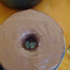 A picture of Hot chocolate chocolate cake w/ cream cheese frosting.