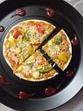 Corn, capsicum makhni pizza