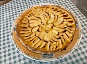 Une photo de Tarte flan à la pomme, orange et citron