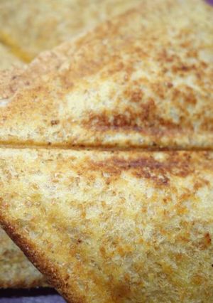 A picture of Toasted cheese and tomato.