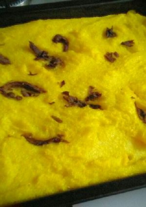 Una foto de Polenta horneada con hongos de pino💜