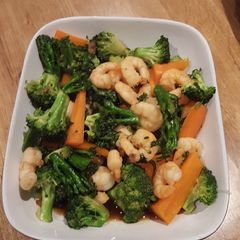 A picture of Stir fry broccoli and prawns.