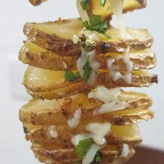 A picture of Spiral Cheese Baked Potatoes.