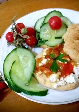 A picture of Savory scones with feta cheese and grilled peppers, tomato.