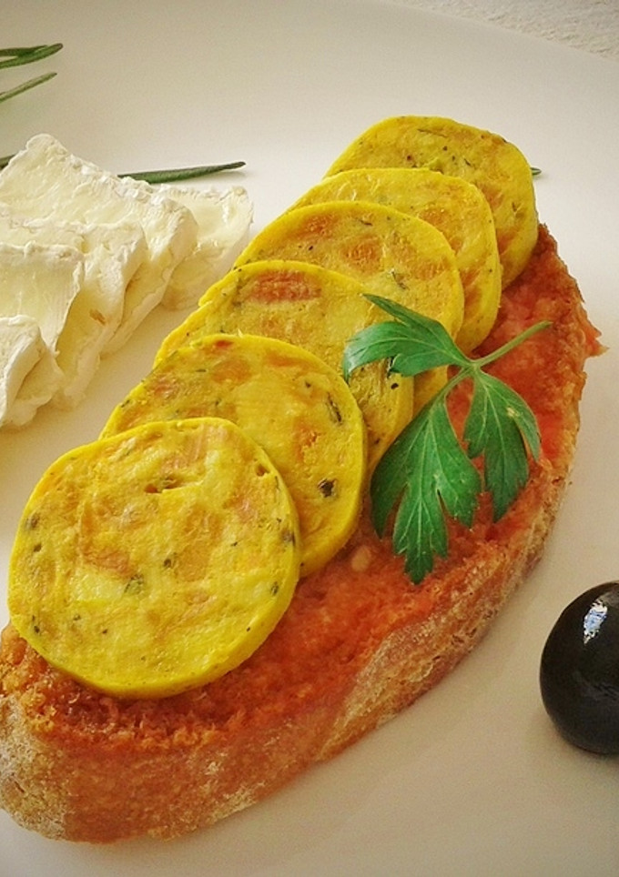 Una foto de Tostada con butifarra de huevo