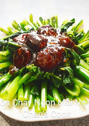 Hình của món Rau cải sốt nấm đông cô dầu hào.