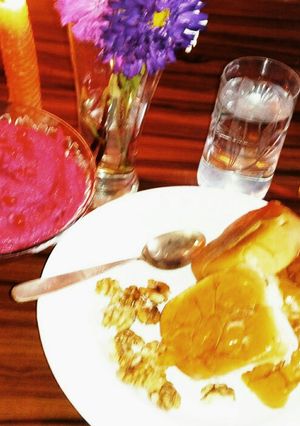 A picture of Vada bread with hummus dip.