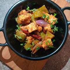 A picture of PANEER CAPSICUM in HOT GARLIC SAUCE.