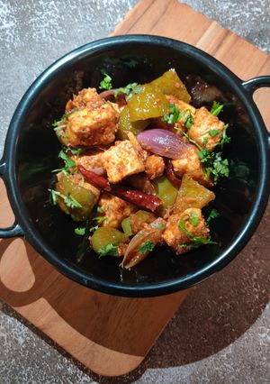 A picture of PANEER CAPSICUM in HOT GARLIC SAUCE.