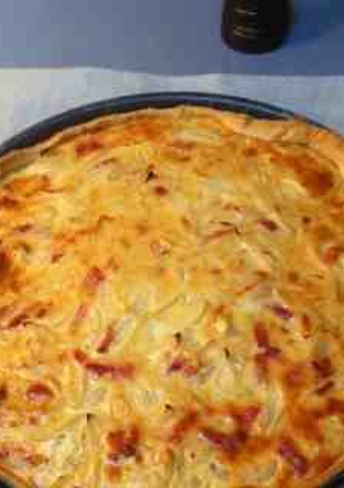 Una foto de Tarta de queso y cebolla