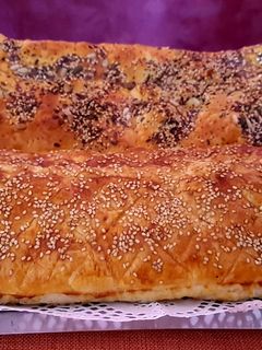 Una foto de Hojaldres de chorizo y queso y de jamón york, queso y aceitunas