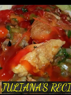 A picture of Chicken in sauce.