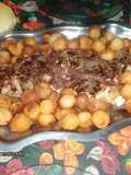 Pecetito de cerdo mechado con Roquefort al vino tinto con papas noisette saborizadas