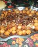 Pecetito de cerdo mechado con Roquefort al vino tinto con papas noisette saborizadas