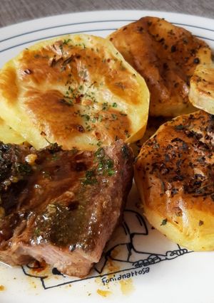 Una foto de Tapa de asado con papas al horno